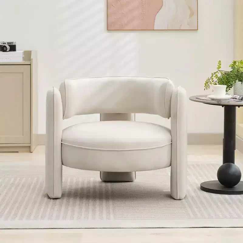 Poltrona a pozzetto in velluto con braccioli, color beige