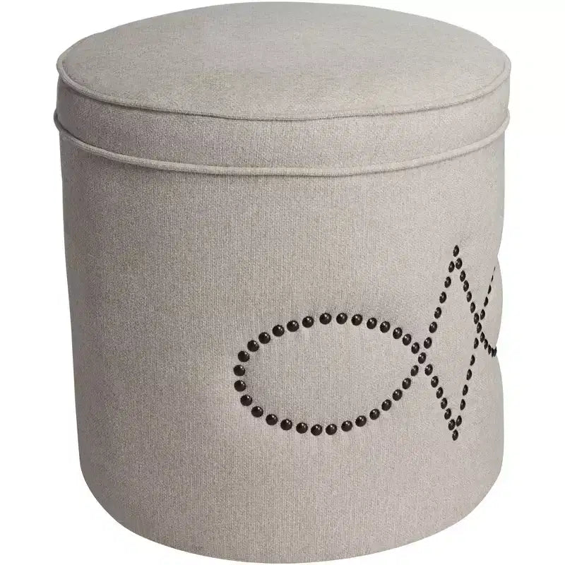 Pouf rotondo rivestito con borchie decorative